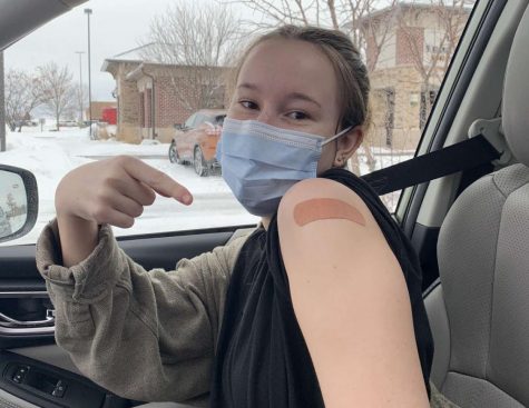 Junior Addie Demars gets her second dose of the COVID-19 vaccine at Allina Health pop up clinic. Demars is an essential worker at Boutwells Landing, a senior home, and getting this vaccine is more than just for herself.