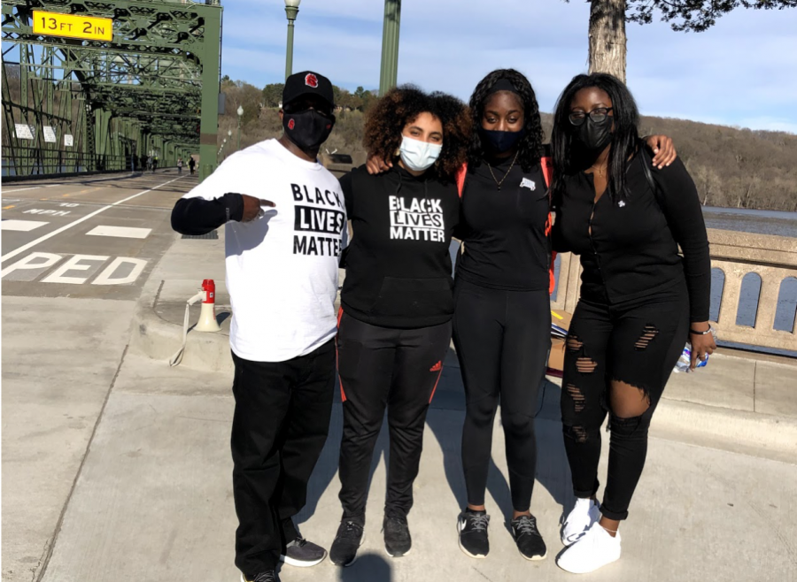 Cornelius Rish and Stillwater Area High School students at the Stillwater Bridge protest for Black Lives Matter. Dressed in Black Lives Matter attire, the activists are fighting for another life lost at the hands of the police.