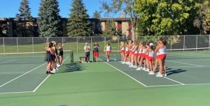 Girls tennis team introduces themselves to Cretin at Cretin-Derham Hall High School on Sept. 23. The team has been working hard at practice to prepare for conference matches like this.