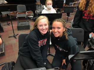 Seniors, Katie Sanderson, and Stella Cockson,  are band mentors in the Band Buddies program. They mentored elementary band students during the 2020-2021 school year, and hope to continue this year.