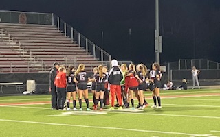 The girls huddle after a win over Maple Grove 3-1. They celebrate another win in the books.