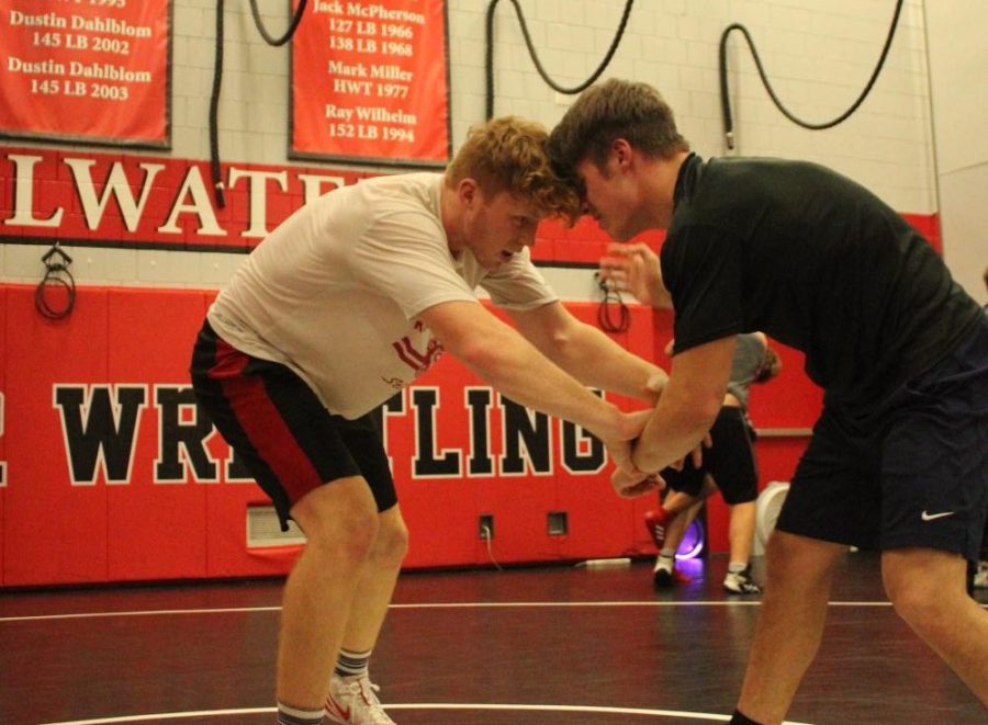 Ryder Rogotzke and Charlie Gleason wrestling.