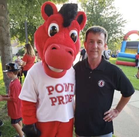 Pete Kelzenberg gets involved in community. He helps out pony pride at a local event. 