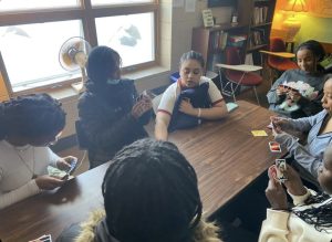 Members of the Sisterhood club playing Uno and bonding after school on Wednesday, Jan 26.