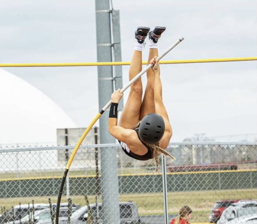 Junior Sophia Roskoski vaults 11 in a meet against Lakeville North.