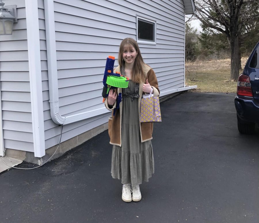 Junior Lydia McFarlene holds up a Nerf Gun, planning to go get some Nerf War kills.