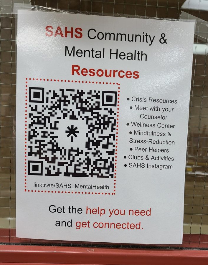 The+Stillwater+Area+High+School+community+and+mental+health+resources+QR+code+taped+to+a+classroom+window.+These+can+be+found+in+every+classroom+in+the+building+for+whenever+a+student+needs+them.