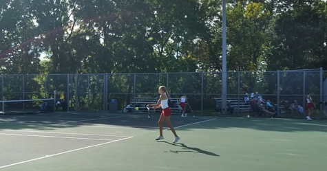 Karina Fischer hits the ball back to her opponent.