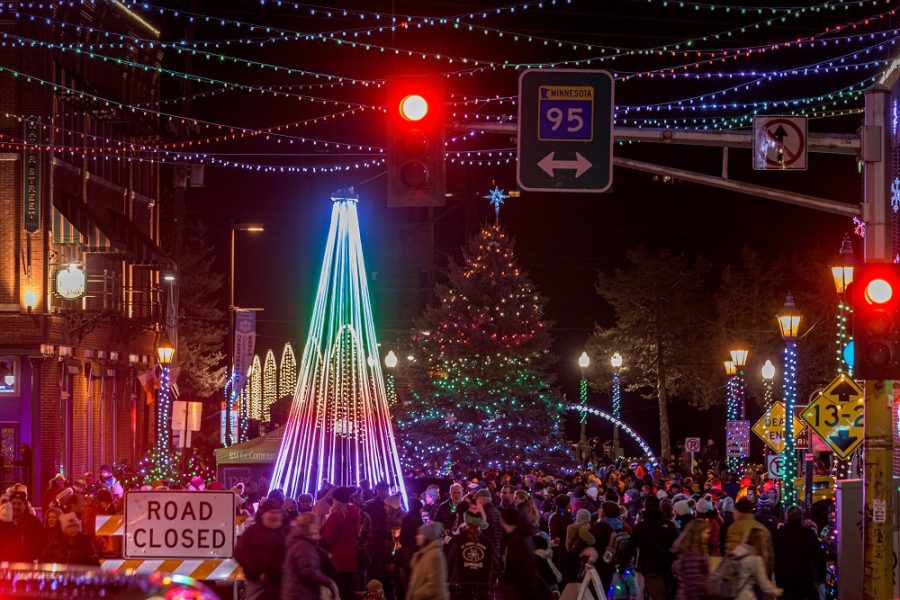 People gathered under the twinkle lights in downtown Stillwater. The bright lights of the holiday celebration brought joy to peoples faces. The cold winter air brought chills filled with hot cider delights
