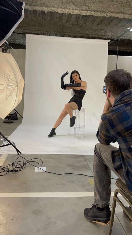 Behind the scenes of Maya in a photoshoot.