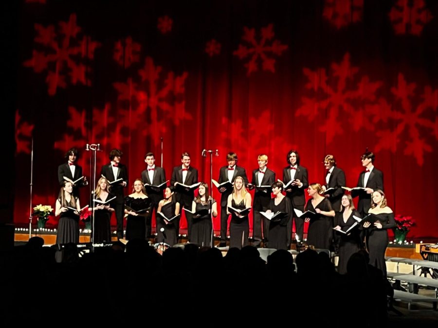 Singers of the Stillwater Concert choir singing in the Vagabonds at a concert.