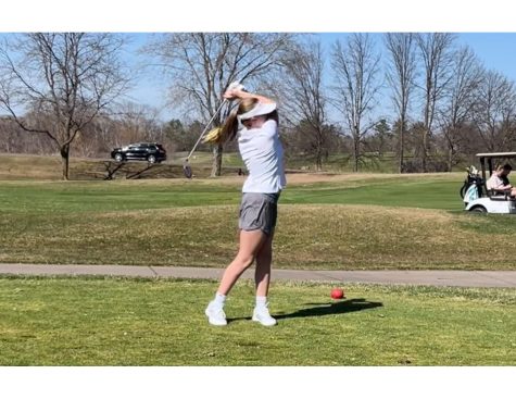 Eighth grader, Avery Crickenberger practicing her swing at Oak Glen golf course. The girls golf team is finally able to get outside and practice. 