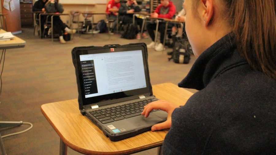 Student using ChatGPT on a computer in class.