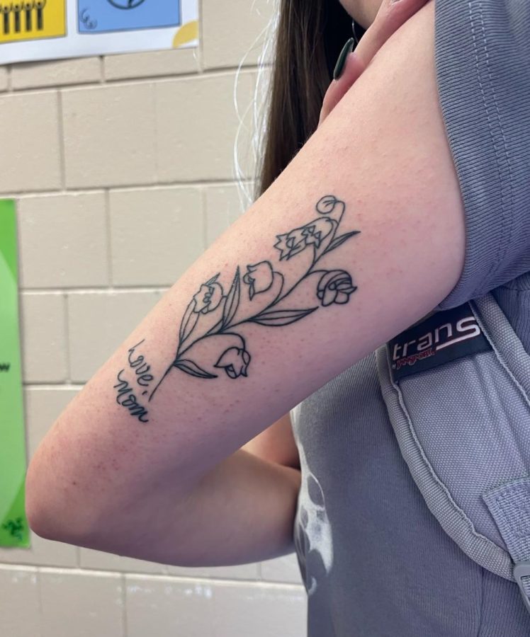 Senior Bella Navarro has a tattoo above her elbow. Navarro has tattoos and piercings to express herself.