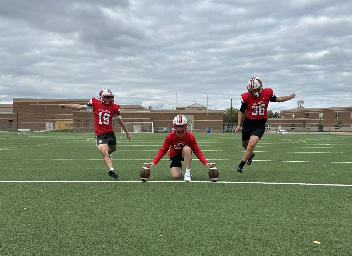 Senior Shawn Stephens and junior Landon Huber practice their kicks for an upcoming game later in the week. It is anticipated that they will be successful with their contribution to the team.