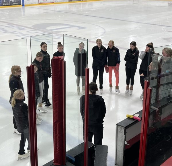 Skaters skate on ice for their first practice. The team is getting ready to create their program for performing this winter. They challenge themselves in drills physically as well as mentally to further their individual skills. 
