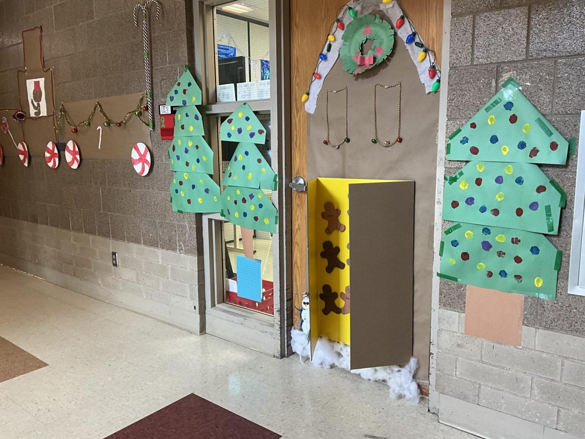 Gingerbread houses adorn the hallways and are competing to win the holiday decorating contest.