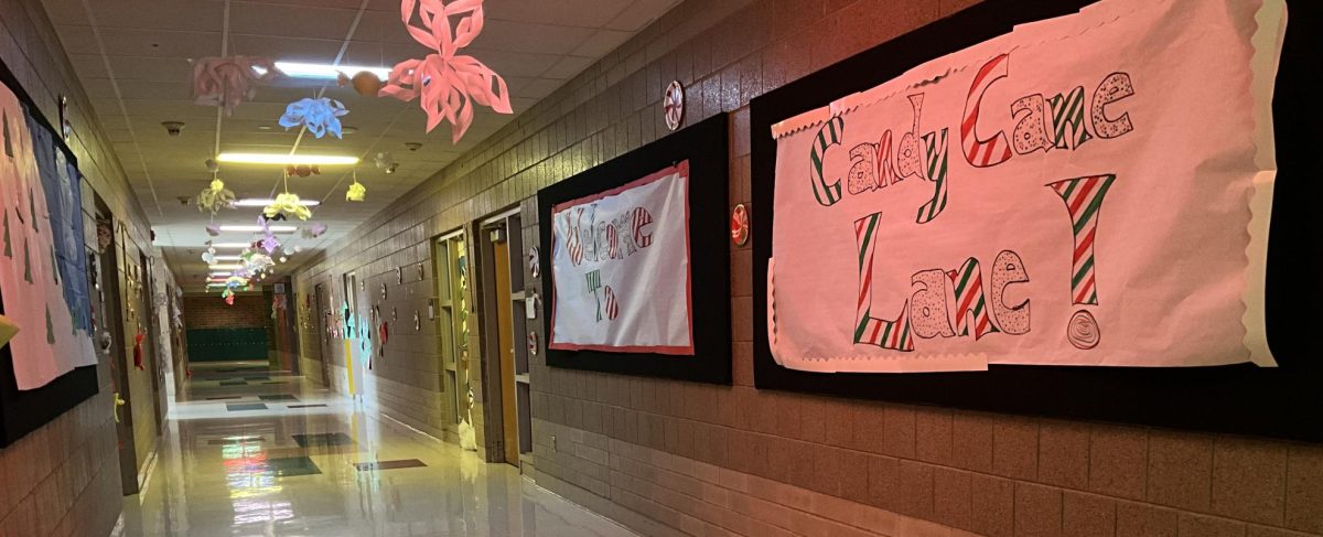 Candy Cane Lane is competing in the holiday hallway decorating contest.