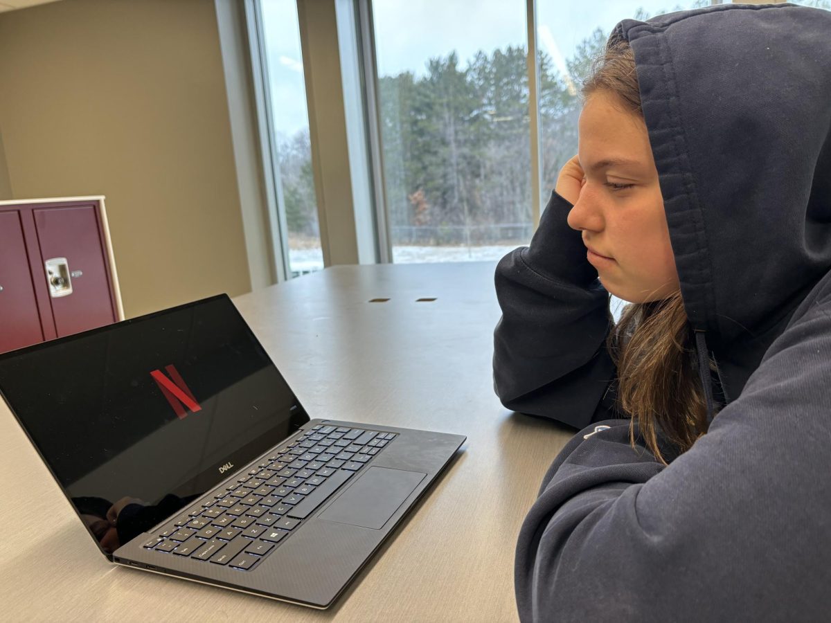 Sophomore Ava Wilmes loads up Netflix. The growing accessibility to shows allows her to watch anywhere. 
