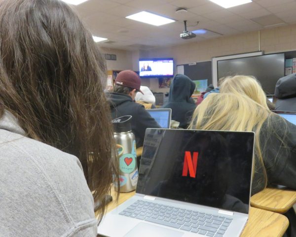 Senior Marissa Fassick watches Netflix on her computer. It is crucial to recognize how our viewing choices affect our well-being and what healthy consumption looks like. 
