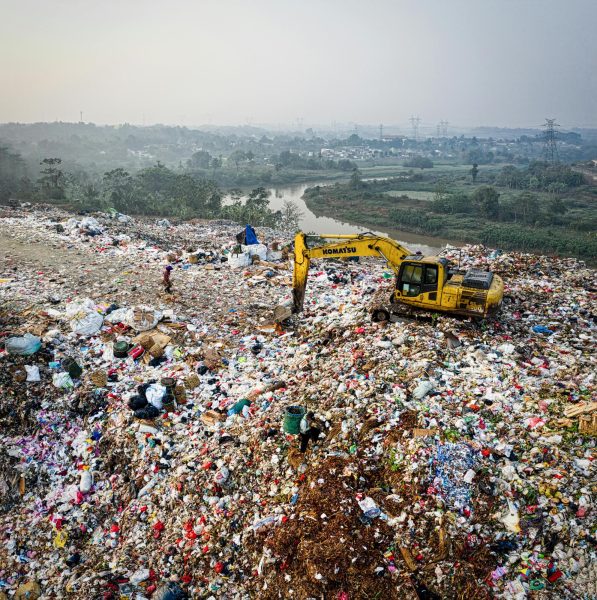 One of the many current gigantic landfills in Indonesia is filled with trash that pollute the area around it. This waste is growing faster due to planned obsolescence causing products use life to be shortened. 