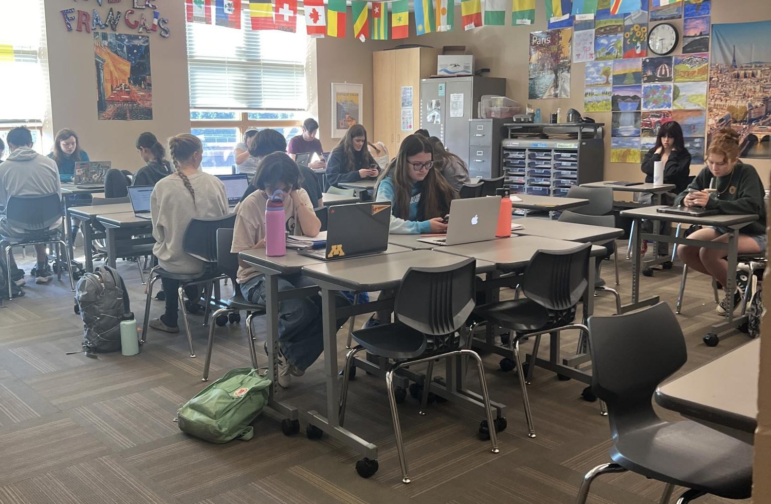 Students in French class are on their phones and not focusing on their school work. The students do not have the motivation to get their required work done and do not care enough to stay motivated at the end of the week. 