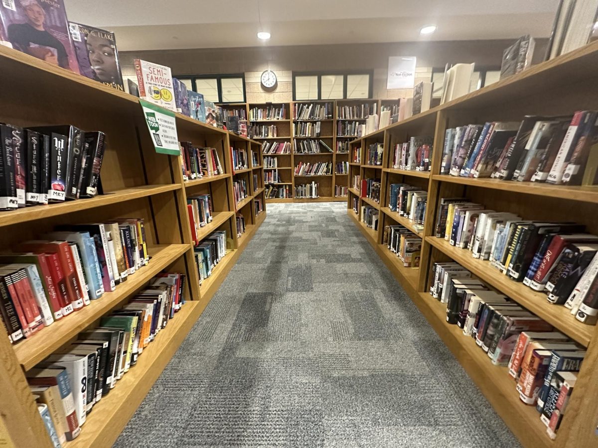 The library shelves hold a very diverse set of books, some of which are being challenged as to whether they should be banned. Students continue to push back to show the importance of these books. How books contribute to a safer place for all. 