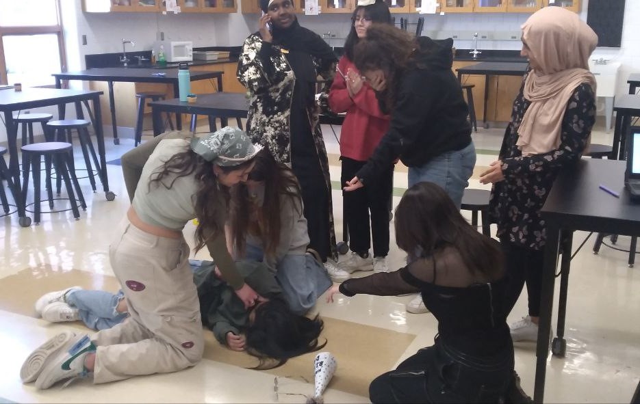 HOSA club practices a CRP sequence during their meeting on March 18. They practice activities similar to this during some of their meetings to prepare for their conferences.