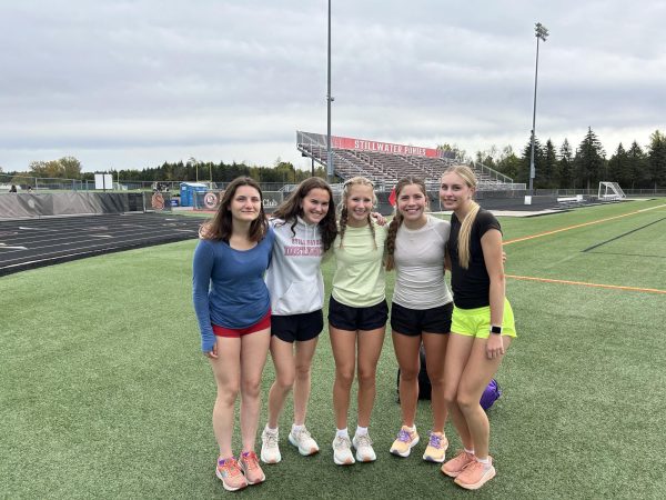 The cross country team at one of their practices. All sticking together for one another.