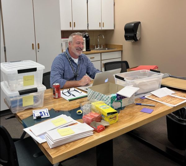 Bob Manning works hard on Planning Pathways Day.  He's enjoying the company from another colleague here.