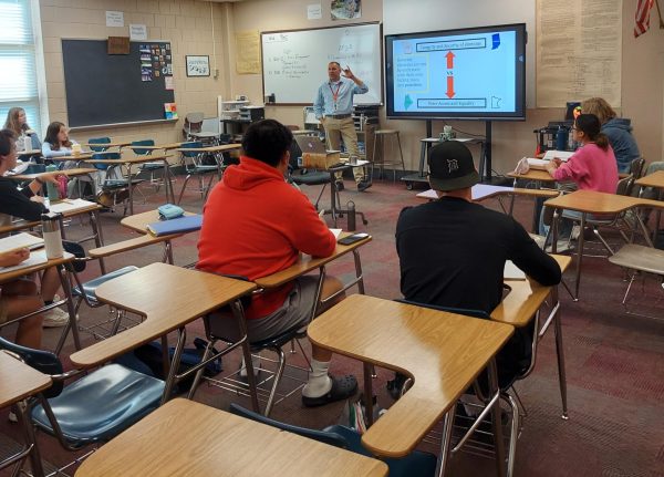 Social studies teacher Matthew Bergquist teaches his AP Gov students. Bergquist hopes to use data from the mock election in his classes.