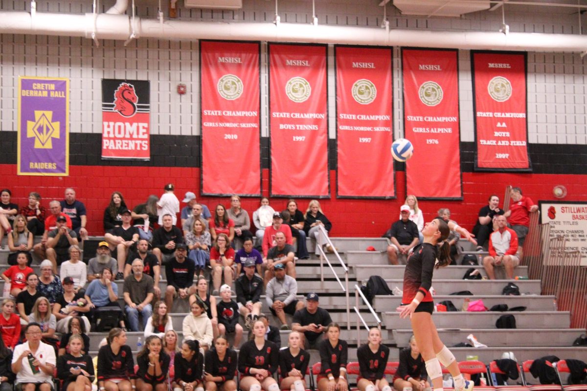 Varsity team Captain, Courtney Peters in grade 11, serves the ball. Scoring a point against the Royals at their game on Sept. 17th.  Junior, Addy Brekke said, she is “so proud of Courtney, she worked so hard to get there. NDSU is going to be a great fit for her”. 