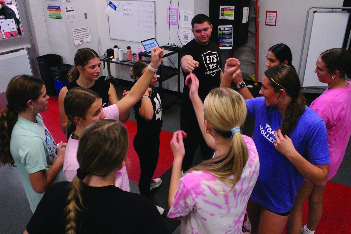 After a 45-minute workout, coach Garbe brings the volleyball team in for a huddle. After the girls leave for practice, he trains off-season baseball players.
"He gets to know athletes on a personal level and is actually interested, not just there to, you know, teach,"  junior Isaac Sainsbury said.