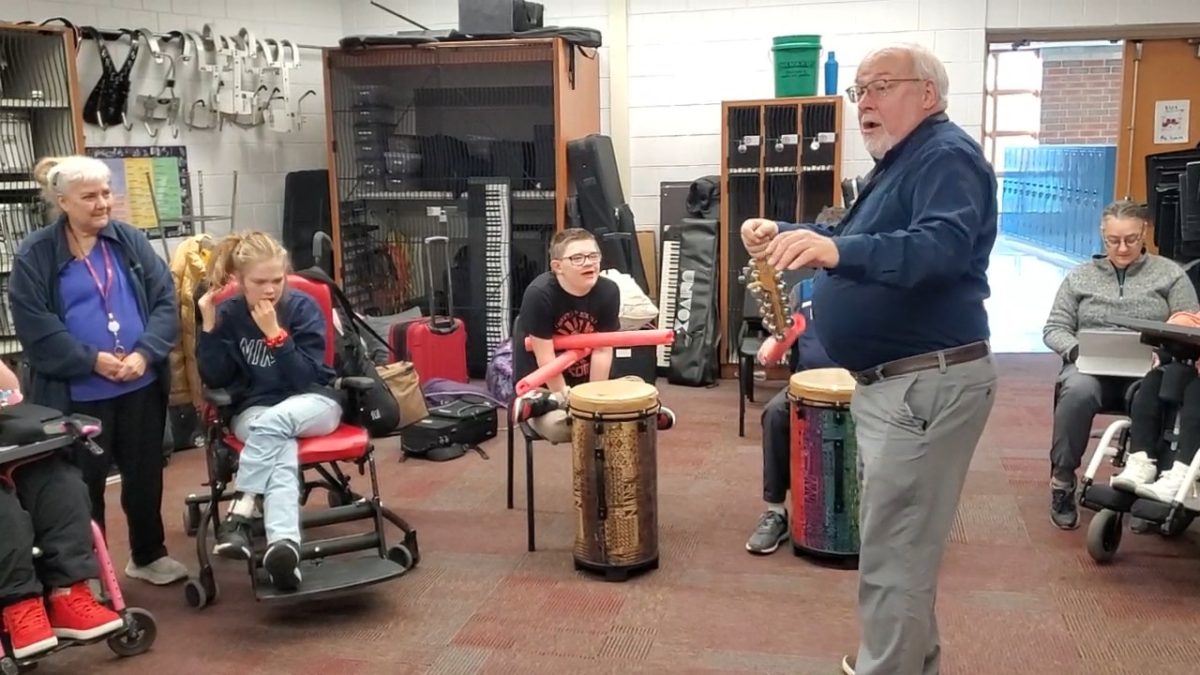 Unified Band Director Dennis Lindsay teaches the new Rock and Rollers percussion ensemble a new song for the Bang on a Drum concert they will be performing in later this year.