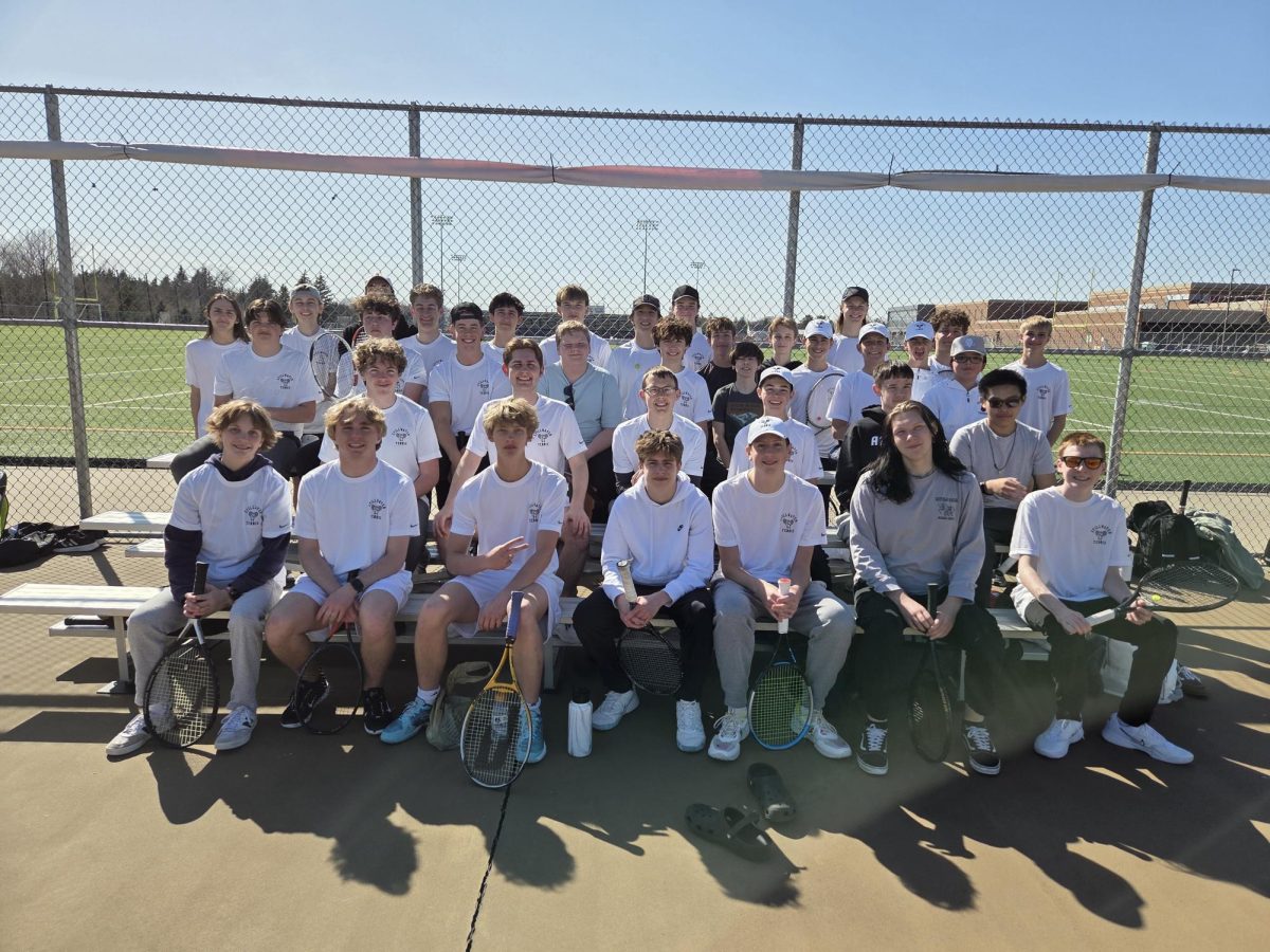 The JV boys tennis team practices every day after school. The team hopes to address its challenges and improve them throughout the season.