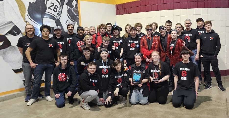 FRC Team 2508 Armada Robotics poses for a group photo after their competition. They won the Team Sustainability Award at the Great Northern Regional competition.