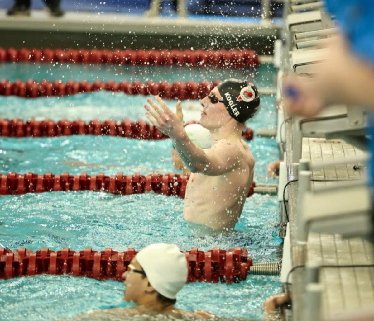 Seinor Jackson Kogler wins his first state championship medal in the 200-meter medley on March 8. Later that day, he went on to win his second medal in the 100-meter backstroke against Minnetonka.