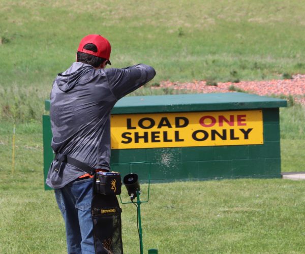 Junior George Kruse gets ready to aim during a competition last week. Kruse would end up doing well helping the team place this meet.