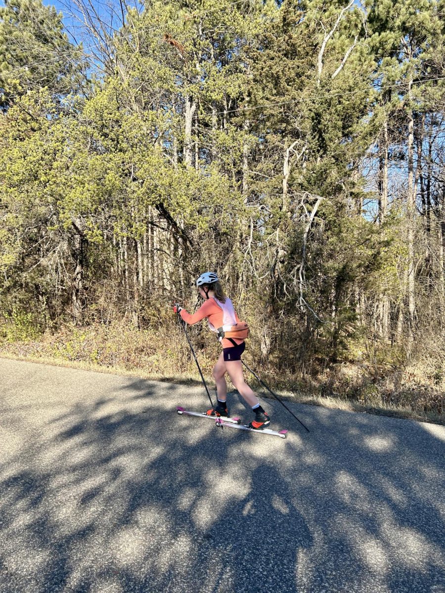 Stillwater Junior Ada Burns works on her striding technique, which is especially helpful for steep climbs. Most skiers work closely with their coaches throughout the summer and into the winter, coined the term “skiiers are made in the summer”.  Burns has worked closely with the girls' head coach, Olivia Ester, including this NOV. 2025 Afton practice.