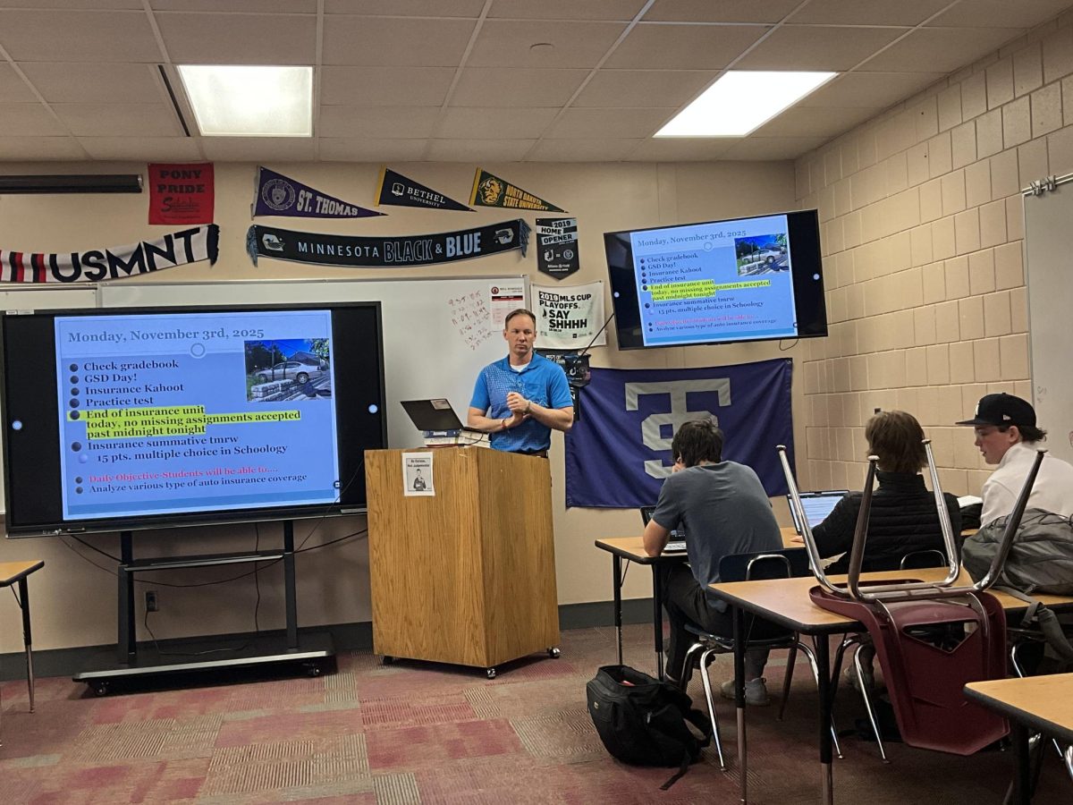 Personal finance teacher Mr. Birklid goes over the class daily objectives and end of the insurance unit with his students. Students prepare for their practice test and insurance summative.