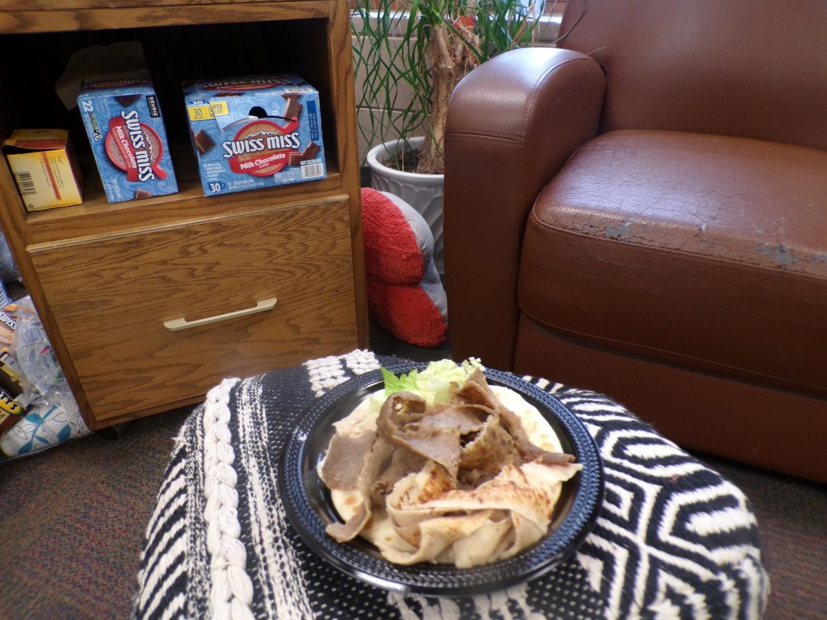 The pita bread acts a safety blanket for all the food. Both on the plate and in your mouth.