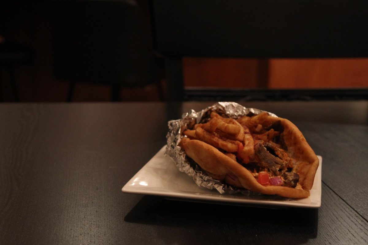 The gyro is wrapped delicately, with meat and vegetables popping out the front. Layers of color, texture and flavor make it impossible to ignore.