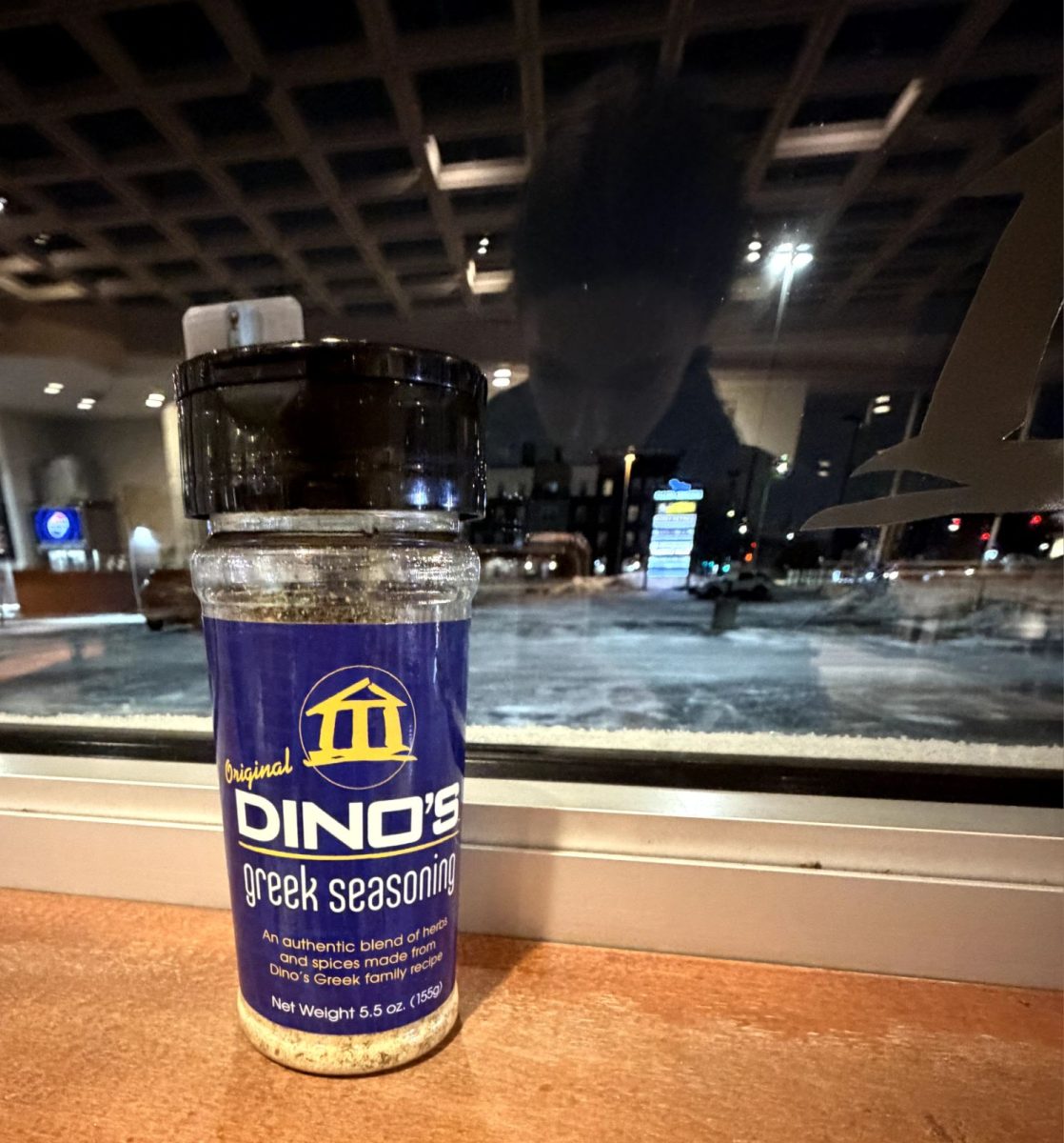 The highly recommended, small in size, Greek seasoning is the support of flavor to their original onion pedals as well as everything else they provide. Also evident in the picture is their recognizable golden temple/pavilion logo.