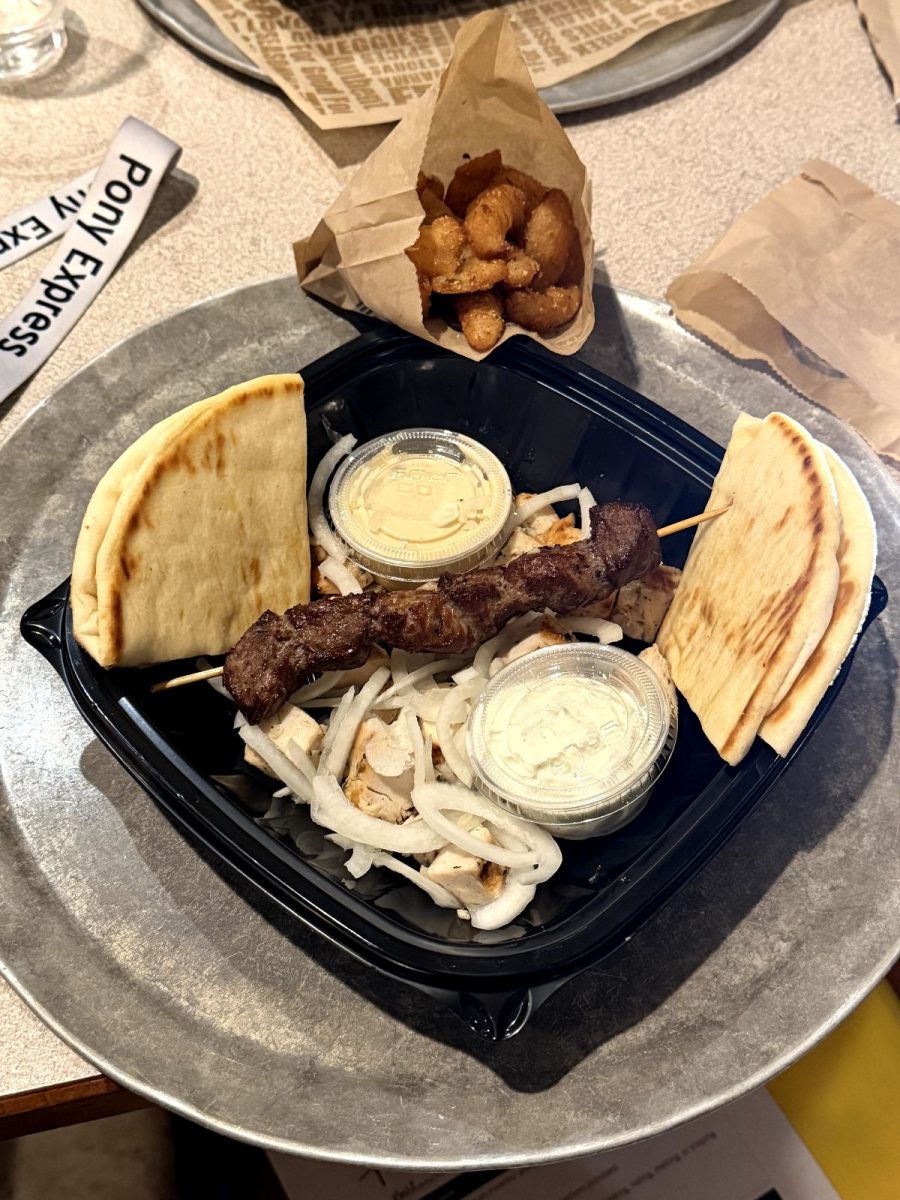 The pita alongside the white onions, delicious chicken, and stacked steak pair together perfectly. Dino's means for you to eat everything together, but with your choice of how to do so.