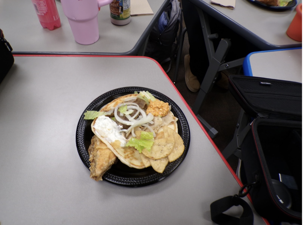 Overhead shot of the plate full of greek food from lunch. Offering Dino's main dish.