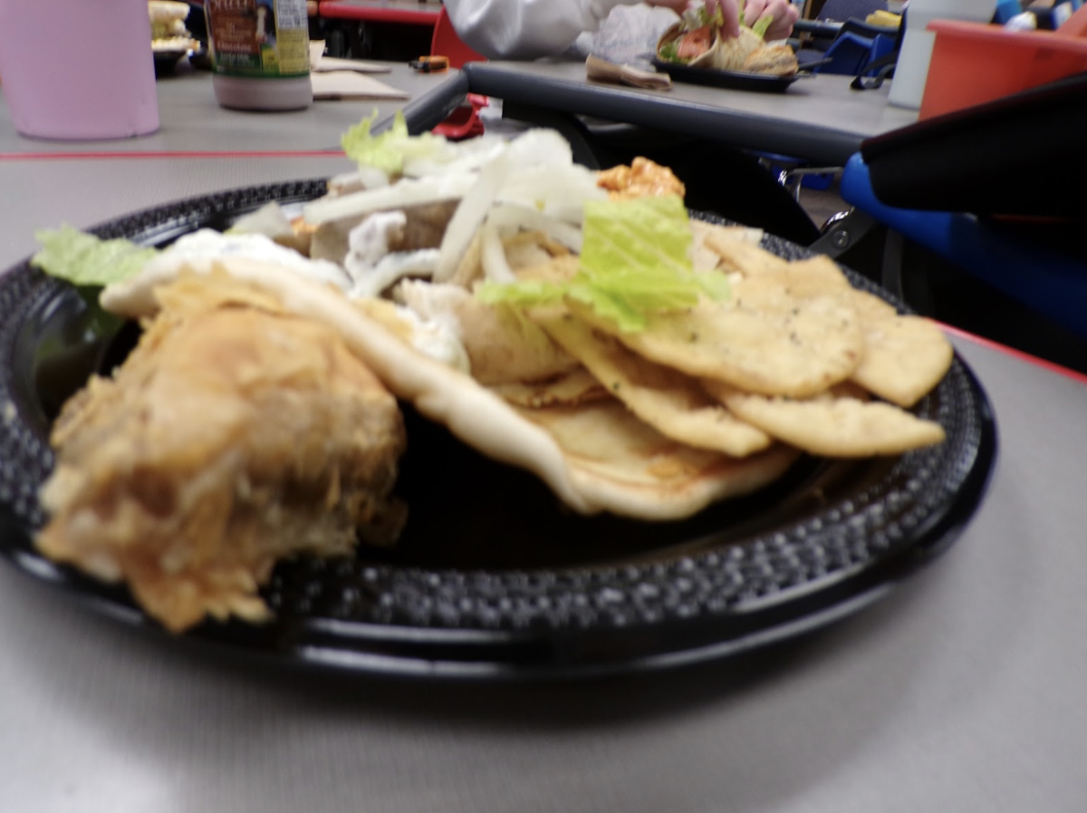 Up close view of the meal. This shows all of the ingredients added in the dish, including the side view of the baklava. 