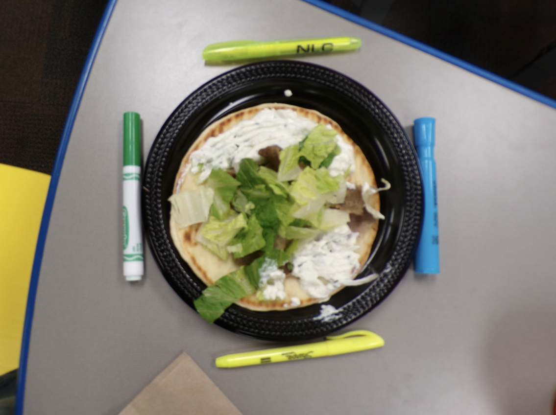 A beautifully presented gyro from Dino’s Gyros, as vibrant as it is flavorful.
