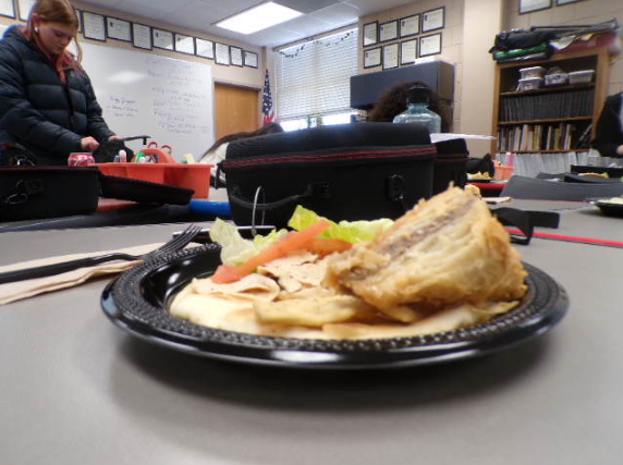 The fresh plate of lettuce, tomato, and chicken is carefully placed on the plate. The food was light and subtle for flavor.