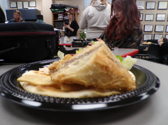 The baklava dominates the plate with the gyro. The multitude of flavors on the plate are thoughtful.