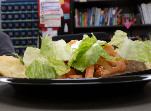 The freshness being shown by an easy glimps of the crunchy lettuce.